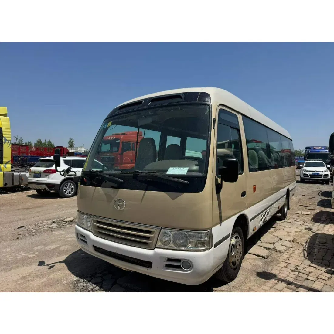 imgi_18_High-Spec-Diesel-Toyota-Coaster-23-Passenger-Van Toyota Coaster 23 Passenger Van – For Sale From China | EVOVED - Image 1
